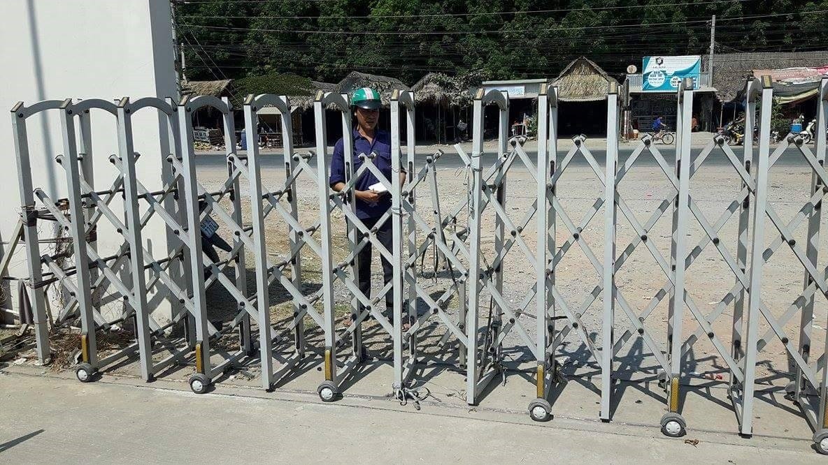 sửa cửa cổng xếp kcn Vsip 2